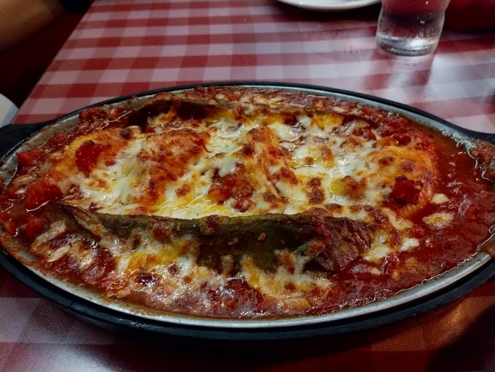 Caruso’s Real Italian signature dishes Lasagna CarusoEggplant ParmigianaShrimp ScampiThe Chairman of the Board (baked pasta dish)
